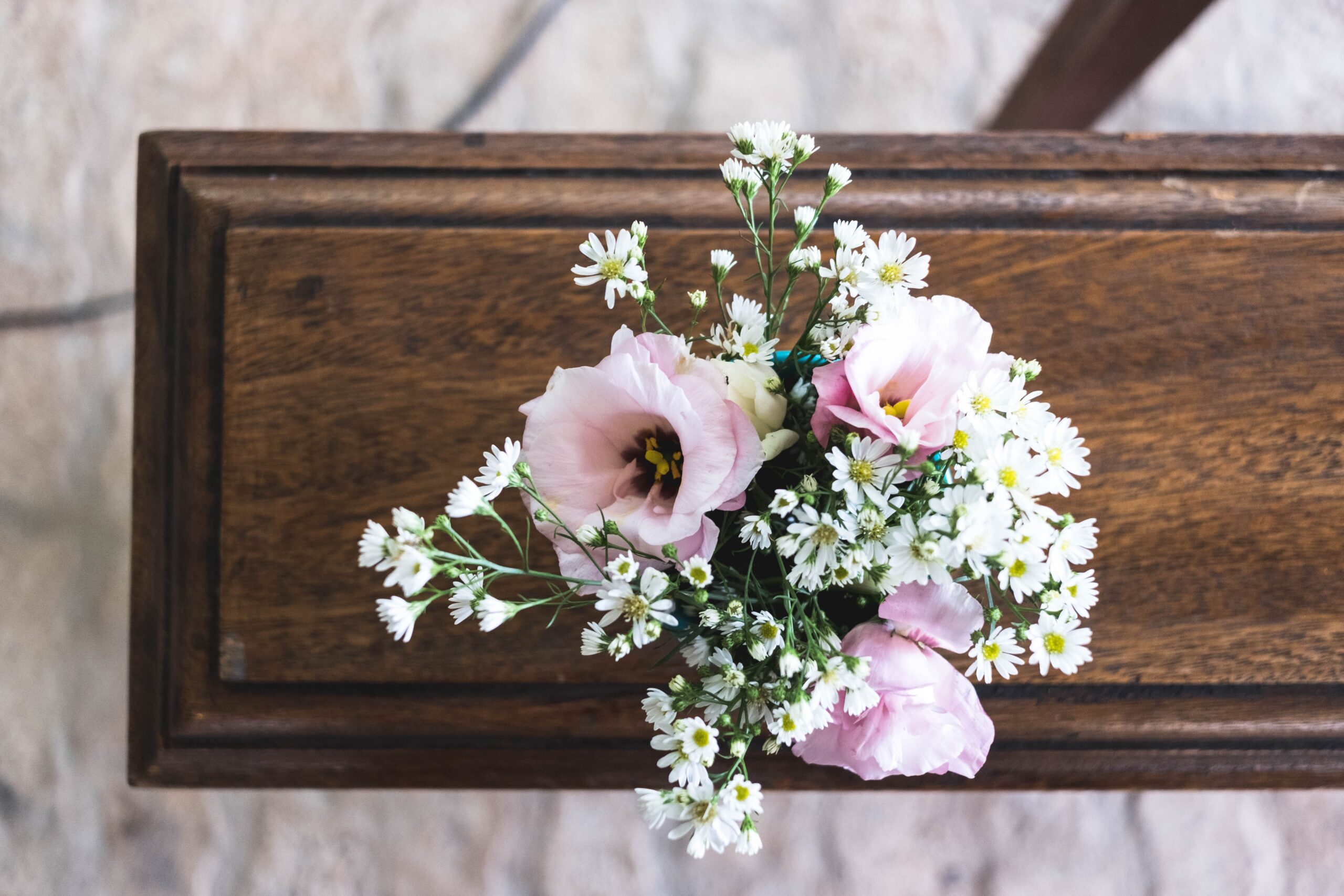 wood-coffin-with-flowers